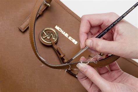 michael kors rubber strap|Michael Kors purse straps fraying.